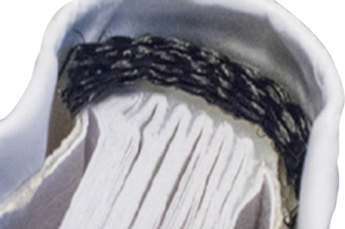 White hardcover book with a black head or tail band