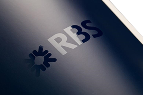 Glossy varnish on the spine of the book.