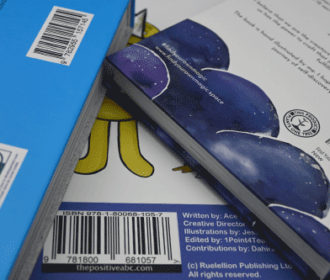 Three books with ISBN on the back of each